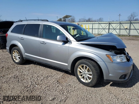 2017 Dodge Journey SXT with VIN 3C4PDDBG6HT528869, listed as a Copart auction lot 54006055 with 118,643 mi miles and Salvage title. Bid and sale history available at DreamBid. Image 4.
