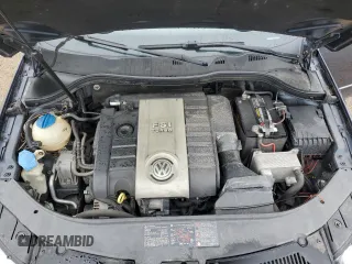 2007 Volkswagen Passat Wolfsburg Edition z VIN WVWAK73C47P140065, wystawiony jako Copart lot #57524315 z przebiegiem 189 924 mil mil oraz Szkoda całkowita • Salvage title. Historia ofert i sprzedaży dostępna na DreamBid. Obrazek 11.