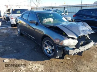 2014 Dodge Charger SXT with VIN 2C3CDXHG7EH325117, listed as a IAAI auction lot 41482634 with 106,761 mi miles. Bid and sale history available at carsss.com. Image 1.