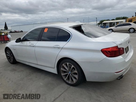 2016 BMW 5 Series 528i with VIN WBA5A5C57GG352367, listed as a Copart auction lot 54202325 with 90,284 mi miles and Salvage title. Bid and sale history available at DreamBid. Image 2.