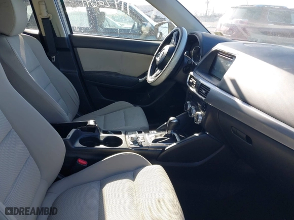 2016 Mazda CX-5 Touring with VIN JM3KE4CYXG0917841, listed as a IAAI auction lot 41420641 with 75,710 mi miles. Bid and sale history available at carsss.com. Image 5.
