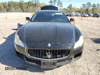 2014 Maserati Quattroporte S Q4 z VIN ZAM56RRA3E1123518, wystawiony jako Copart lot #49866795 z przebiegiem 89 889 mil mil oraz Szkody całkowita. Historia ofert i sprzedaży dostępna na DreamBid. Obrazek 5.