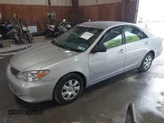 2004 Toyota Camry LE with VIN 4T1BE32K64U327071, listed as a IAAI auction lot 42438458 with 194,614 mi miles and . Bid and sale history available at DreamBid. Image 2.