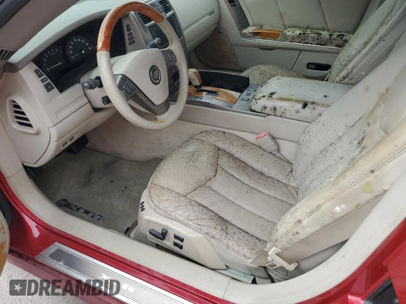 2005 Cadillac XLR z VIN 1G6YV34A855601016, wystawiony jako Copart lot #74436784 z przebiegiem Nie podano mil oraz Szkody całkowita. Historia ofert i sprzedaży dostępna na DreamBid. Obrazek 7.