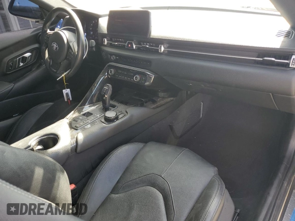 2020 Toyota Supra 3.0 с VIN WZ1DB4C01LW027810, выставлен на аукционе Copart как лот 45732275 с пробегом 26 734 миль миль и Списание • Salvage title. История ставок и продаж доступна на DreamBid. Изображение 8.
