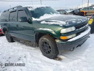 2003 Chevrolet Suburban LT z VIN 3GNFK16Z63G166885, wystawiony jako IAAI lot #41150771 z przebiegiem 290 630 mil mil oraz . Historia ofert i sprzedaży dostępna na DreamBid. Obrazek 1.