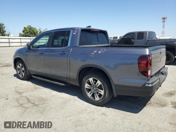 2019 Honda Ridgeline RTL-T with VIN 5FPYK2F68KB003907, listed as a Copart auction lot 61276325 with 59,612 mi miles and Salvage title. Bid and sale history available at DreamBid. Image 2.