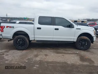 2018 Ford F-150 XL with VIN 1FTEW1EP4JFD42727, listed as a IAAI auction lot 41209698 with 131,234 mi miles. Bid and sale history available at carsss.com. Image 13.