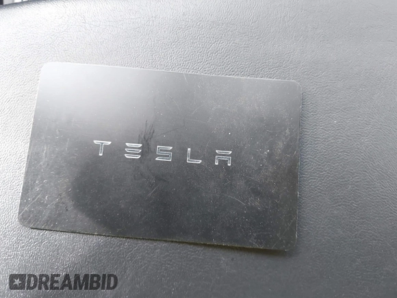 2019 Tesla Model 3 Long Range with VIN 5YJ3E1EB7KF442390, listed as a IAAI auction lot 41700122 with 65,539 mi miles. Bid and sale history available at carsss.com. Image 11.