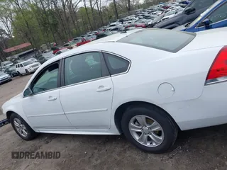 2014 Chevrolet Impala LS with VIN 2G1WA5E31E1163087, listed as a IAAI auction lot 41895666 with 138,348 mi miles and . Bid and sale history available at DreamBid. Image 15.