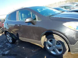 2015 Buick Encore with VIN KL4CJASBXFB192324, listed as a IAAI auction lot 41372733 with 97,126 mi miles. Bid and sale history available at carsss.com. Image 13.