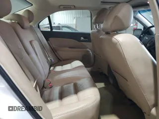 2012 Ford Fusion SEL with VIN 3FAHP0JA9CR167134, listed as a Copart auction lot 50869835 with 128,956 mi miles and Salvage Title. Bid and sale history available at DreamBid. Image 10.