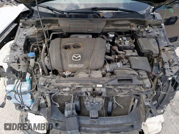 2018 Mazda CX-5 Grand Touring with VIN JM3KFBDM6J0414523, listed as a Copart auction lot 57581145 with 69,353 mi miles and Salvage title. Bid and sale history available at DreamBid. Image 12.