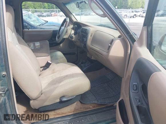 2001 Mazda B-Series Truck DS with VIN 4F4YR16U51TM20742, listed as a IAAI auction lot 42168749 with 226,272 mi miles and . Bid and sale history available at DreamBid. Image 5.