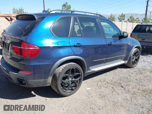 2012 BMW X5 50i with VIN 5UXZV8C57CL423223, listed as a IAAI auction lot 42606594 with 94,695 mi miles and . Bid and sale history available at DreamBid. Image 4.