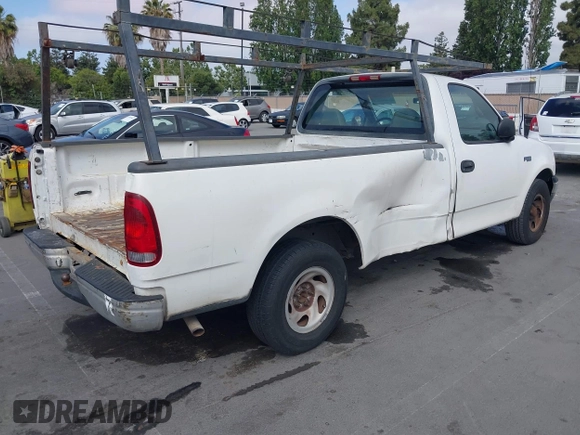 2000 Ford F-150 XL with VIN 1FTZF1724YNB21874, listed as a IAAI auction lot 42489948 with 117,906 mi miles and . Bid and sale history available at DreamBid. Image 4.