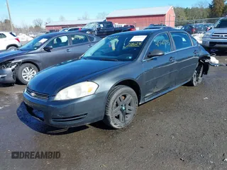 2013 Chevrolet Impala Police with VIN 2G1WD5E39D1228628, listed as a IAAI auction lot 41560393 with 173,236 mi miles. Bid and sale history available at carsss.com. Image 2.