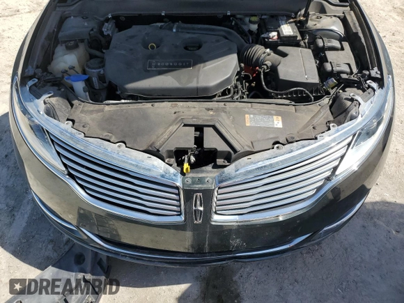 2016 Lincoln MKZ с VIN 3LN6L2G95GR606837, выставлен на аукционе Copart как лот 57356815 с пробегом 67 898 миль миль и Списание • Salvage title. История ставок и продаж доступна на DreamBid. Изображение 11.