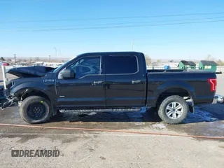 2015 Ford F-150 XLT with VIN 1FTEW1EP0FFC39327, listed as a IAAI auction lot 41012296 with 198,611 mi miles. Bid and sale history available at carsss.com. Image 15.