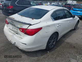 2015 Infiniti Q50 Premium with VIN JN1BV7AR5FM390985, listed as a IAAI auction lot 42641031 with 117,060 mi miles and . Bid and sale history available at DreamBid. Image 4.