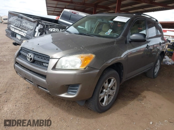 2009 Toyota RAV4 with VIN JTMBK33V895074715, listed as a IAAI auction lot 41802446 with 215,892 mi miles. Bid and sale history available at carsss.com. Image 2.
