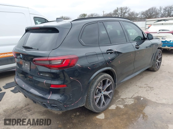 2022 BMW X5 sDrive40i with VIN 5UXCR4C07N9M28669, listed as a IAAI auction lot 41543581 with 59,497 mi miles. Bid and sale history available at carsss.com. Image 4.