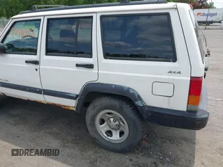 1998 Jeep Cherokee Sport z VIN 1J4FJ68SXWL243008, wystawiony jako IAAI lot #42411968 z przebiegiem 147 680 mil mil oraz . Historia ofert i sprzedaży dostępna na DreamBid. Obrazek 14.