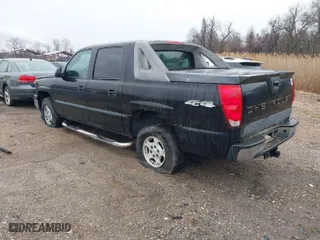 2003 Chevrolet Avalanche with VIN 3GNEK13T93G275451, listed as a IAAI auction lot 41875087 with 196,026 mi miles. Bid and sale history available at carsss.com. Image 3.