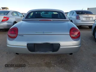 2005 Ford Thunderbird Deluxe with VIN 1FAHP60A75Y100511, listed as a IAAI auction lot 41550644 with Not Provided miles and . Bid and sale history available at DreamBid. Image 16.