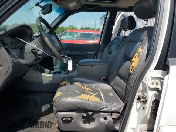 2002 Ford Explorer Sport Trac Value with VIN 1FMZU67E42UD15004, listed as a Copart auction lot 54129135 with 129,952 mi miles and Salvage title. Bid and sale history available at DreamBid. Image 7.