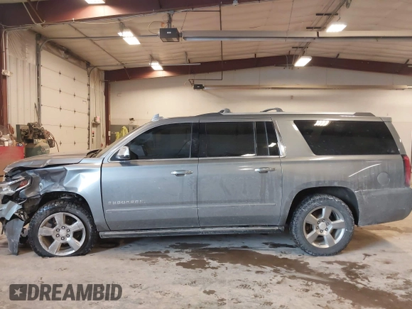 2019 Chevrolet Suburban Premier with VIN 1GNSKJKC1KR291629, listed as a IAAI auction lot 41565675 with 129,672 mi miles and . Bid and sale history available at DreamBid. Image 14.