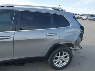 2014 Jeep Cherokee Latitude z VIN 1C4PJMCS8EW230213, wystawiony jako IAAI lot #42011183 z przebiegiem 133 299 mil mil oraz . Historia ofert i sprzedaży dostępna na DreamBid. Obrazek 22.