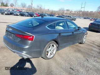 2021 Audi A5 Sportback S line Premium Plus with VIN WAUFACF52MA047877, listed as a IAAI auction lot 41643604 with 34,912 mi miles. Bid and sale history available at carsss.com. Image 4.