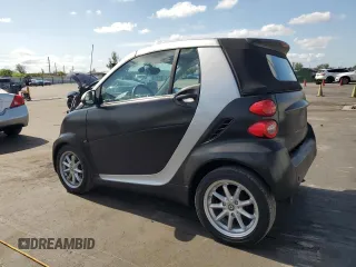 2009 Smart fortwo Passion with VIN WMEEK31X59K232027, listed as a Copart auction lot 55982195 with 63,945 mi miles and Salvage Title. Bid and sale history available at DreamBid. Image 2.