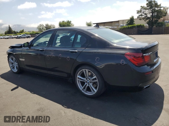 2013 BMW 7 Series 740i with VIN WBAYA6C58DC994974, listed as a Copart auction lot 55534645 with 106,975 mi miles and Salvage title. Bid and sale history available at DreamBid. Image 2.