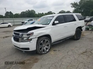 2018 Chevrolet Tahoe LS with VIN 1GNSCAKC6JR181140, listed as a Copart auction lot 57001275 with 220,267 mi miles and Salvage title. Bid and sale history available at DreamBid. Image 1.