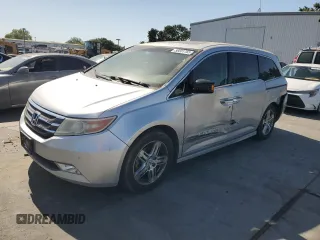 2011 Honda Odyssey Touring с VIN 5FNRL5H92BB063040, выставлен на аукционе Copart как лот 58551765 с пробегом 236 526 миль миль и Списание • Salvage title. История ставок и продаж доступна на DreamBid. Изображение 1.