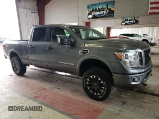 2016 Nissan Titan XD PRO-4X with VIN 1N6BA1F46GN501801, listed as a Copart auction lot 63231474 with 127,728 mi miles and Clean Title. Bid and sale history available at carsss.com. Image 4.
