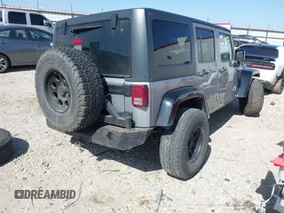 2015 Jeep Wrangler Unlimited Sport z VIN 1C4BJWDG0FL745533, wystawiony jako IAAI lot #41844126 z przebiegiem 151 620 mil mil oraz . Historia ofert i sprzedaży dostępna na DreamBid. Obrazek 4.