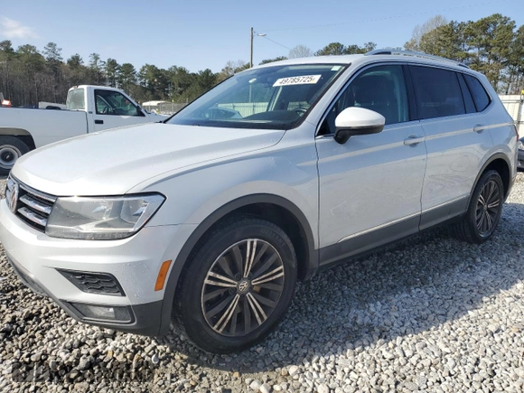 2018 Volkswagen Tiguan SEL with VIN 3VV3B7AX0JM014461, listed as a Copart auction lot 49785725 with 124,868 mi miles and Salvage Title. Bid and sale history available at DreamBid. Image 1.