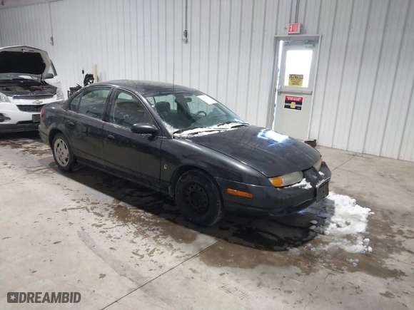 2002 Saturn SL with VIN 1G8ZK52712Z291299, listed as a IAAI auction lot 41608409 with 249,442 mi miles. Bid and sale history available at carsss.com. Image 1.