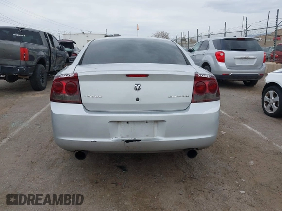 2010 Dodge Charger Police with VIN 2B3AA4CT1AH113596, listed as a IAAI auction lot 41674608 with 194,279 mi miles and . Bid and sale history available at DreamBid. Image 16.