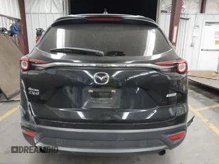 2018 Mazda CX-9 Touring with VIN JM3TCACY9J0213310, listed as a IAAI auction lot 42047663 with 78,409 mi miles and . Bid and sale history available at carsss.com. Image 16.