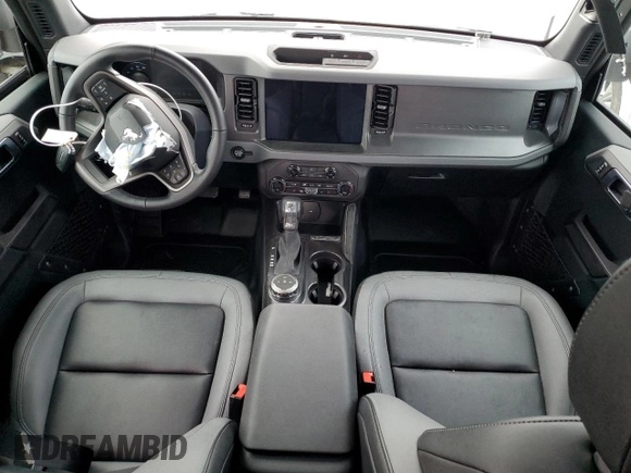2024 Ford Bronco Big Bend z VIN 1FMDE7BH8RLA55673, wystawiony jako Copart lot #83586694 z przebiegiem 2629 mil mil oraz Szkody całkowita. Historia ofert i sprzedaży dostępna na DreamBid. Obrazek 8.