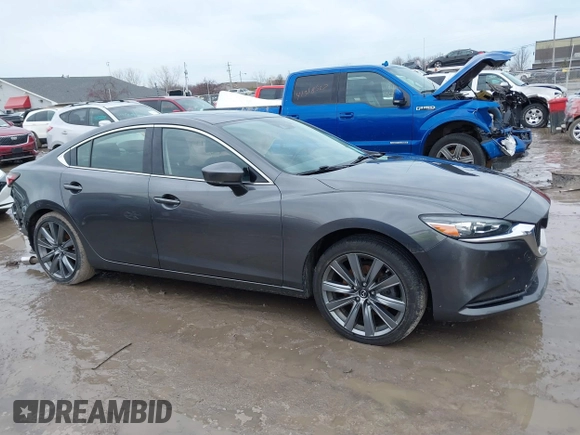 2020 Mazda 6 Grand Touring with VIN JM1GL1TYXL1524543, listed as a IAAI auction lot 41474337 with 52,160 mi miles and . Bid and sale history available at DreamBid. Image 14.