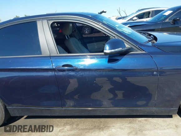 2015 BMW 3 Series 328i with VIN WBA3C1C50FK124300, listed as a IAAI auction lot 40112372 with 142,591 mi miles and . Bid and sale history available at carsss.com. Image 13.