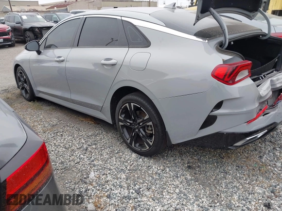 2023 Kia K5 GT-Line z VIN 5XXG64J25PG181772, wystawiony jako IAAI lot #42283124 z przebiegiem 40 857 mil mil oraz . Historia ofert i sprzedaży dostępna na DreamBid. Obrazek 3.
