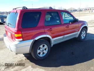 2005 Ford Escape Hybrid with VIN 1FMYU96H05KE01130, listed as a IAAI auction lot 41711338 with 288,964 mi miles. Bid and sale history available at carsss.com. Image 4.