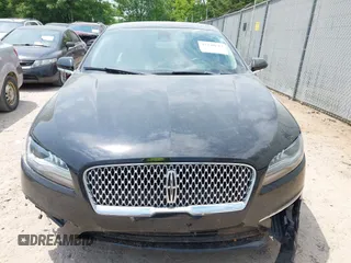 2020 Lincoln MKZ Hybrid Premiere with VIN 3LN6L5KU6LR614453, listed as a IAAI auction lot 42440643 with 76,384 mi miles and . Bid and sale history available at DreamBid. Image 13.