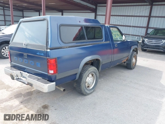 1991 Dodge Dakota z VIN 1B7GG26X3MS259618, wystawiony jako IAAI lot #42316385 z przebiegiem 174 734 mil mil oraz . Historia ofert i sprzedaży dostępna na DreamBid. Obrazek 4.